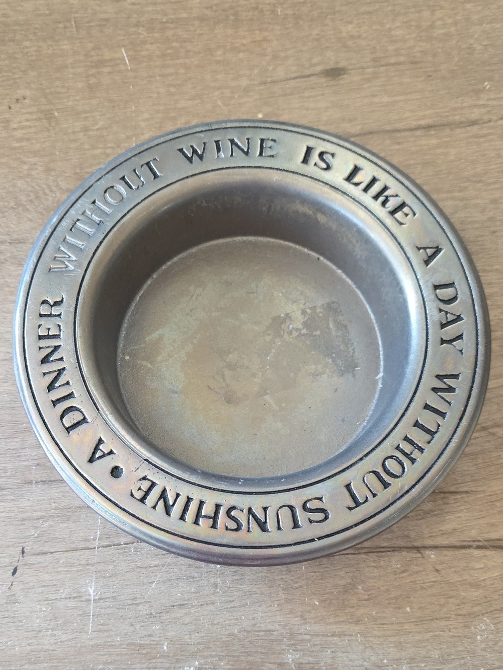Decorative Bronze-Tone Metal Wine Bottle Serving Bowl Stand with Wine Quote